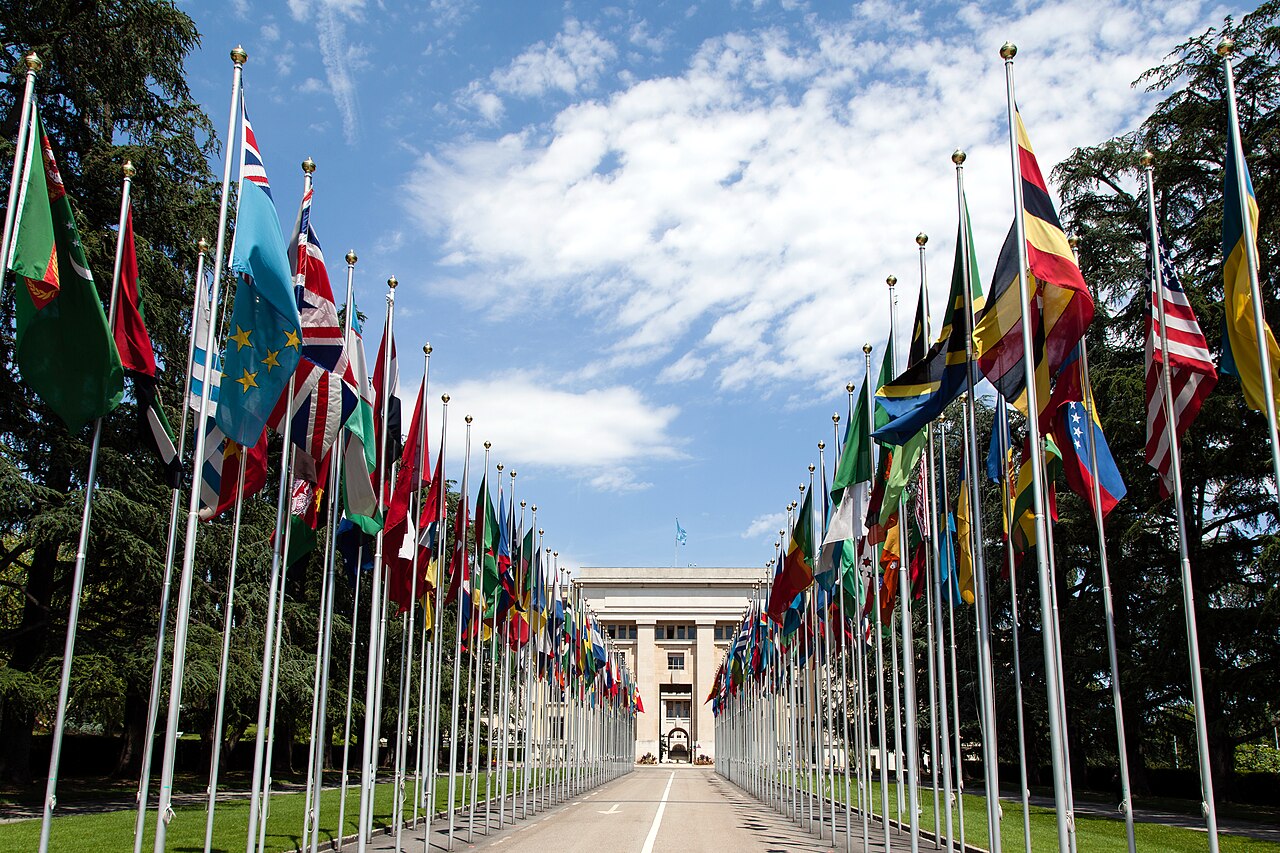 The avenue of United Nations flags in front of the Palais des Nations in Geneva